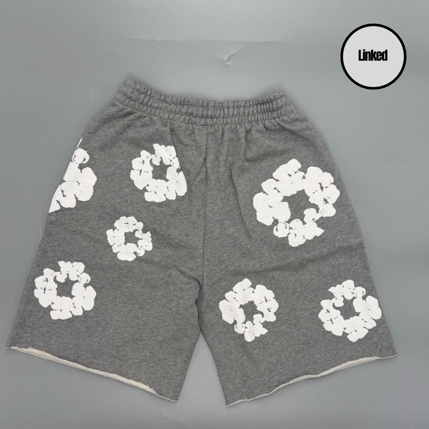 DENIM TEARS GREY SHORTS