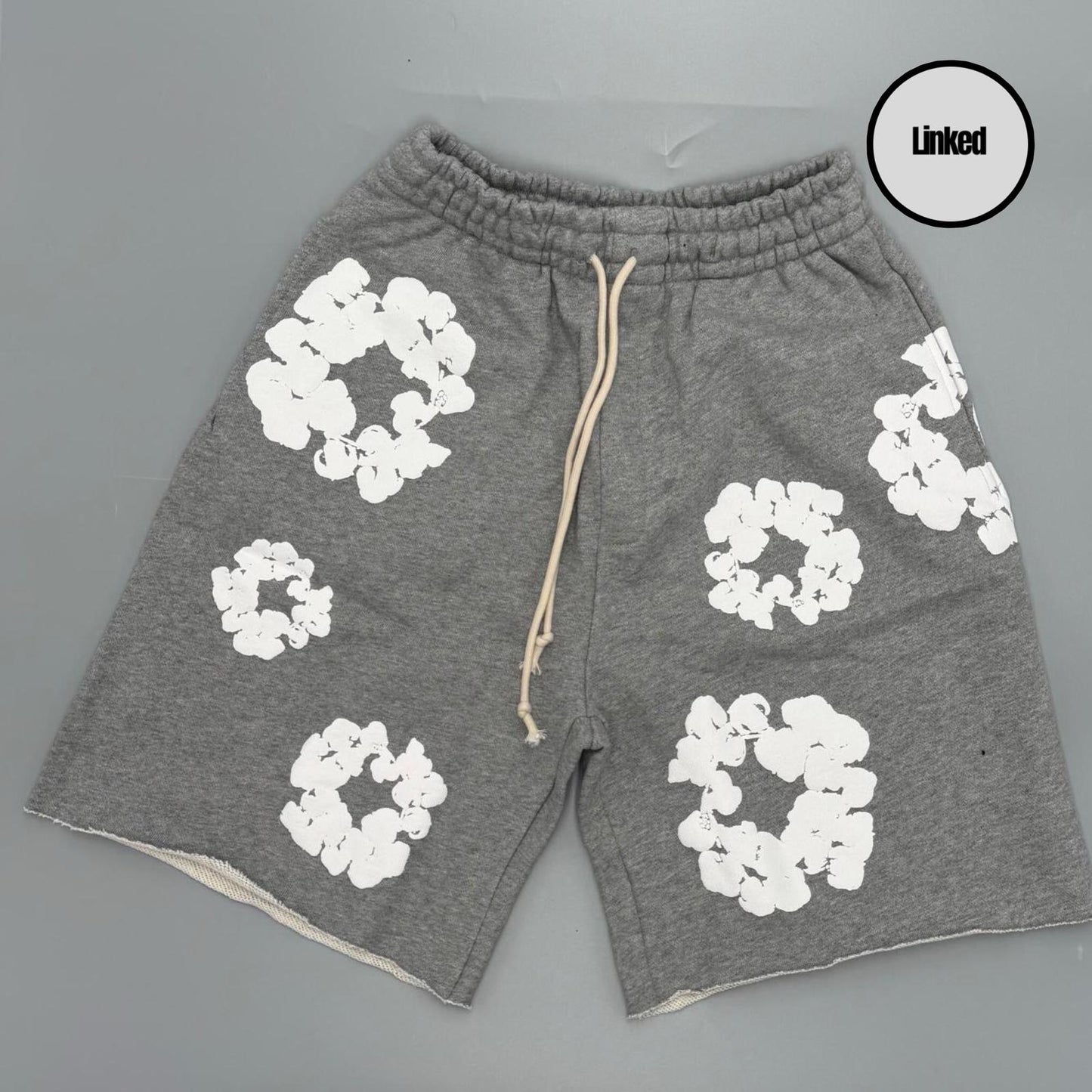 DENIM TEARS GREY SHORTS