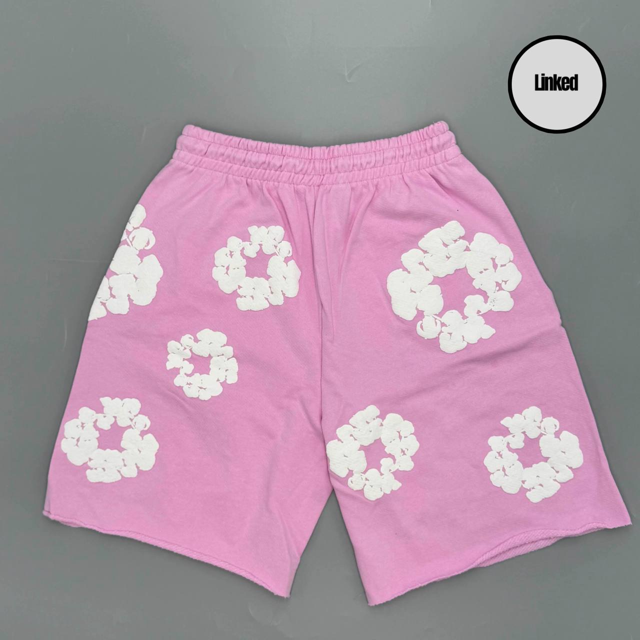 DENIM TEARS PINK SHORTS