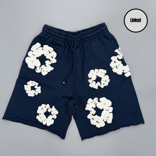 DENIM TEARS NAVY SHORTS